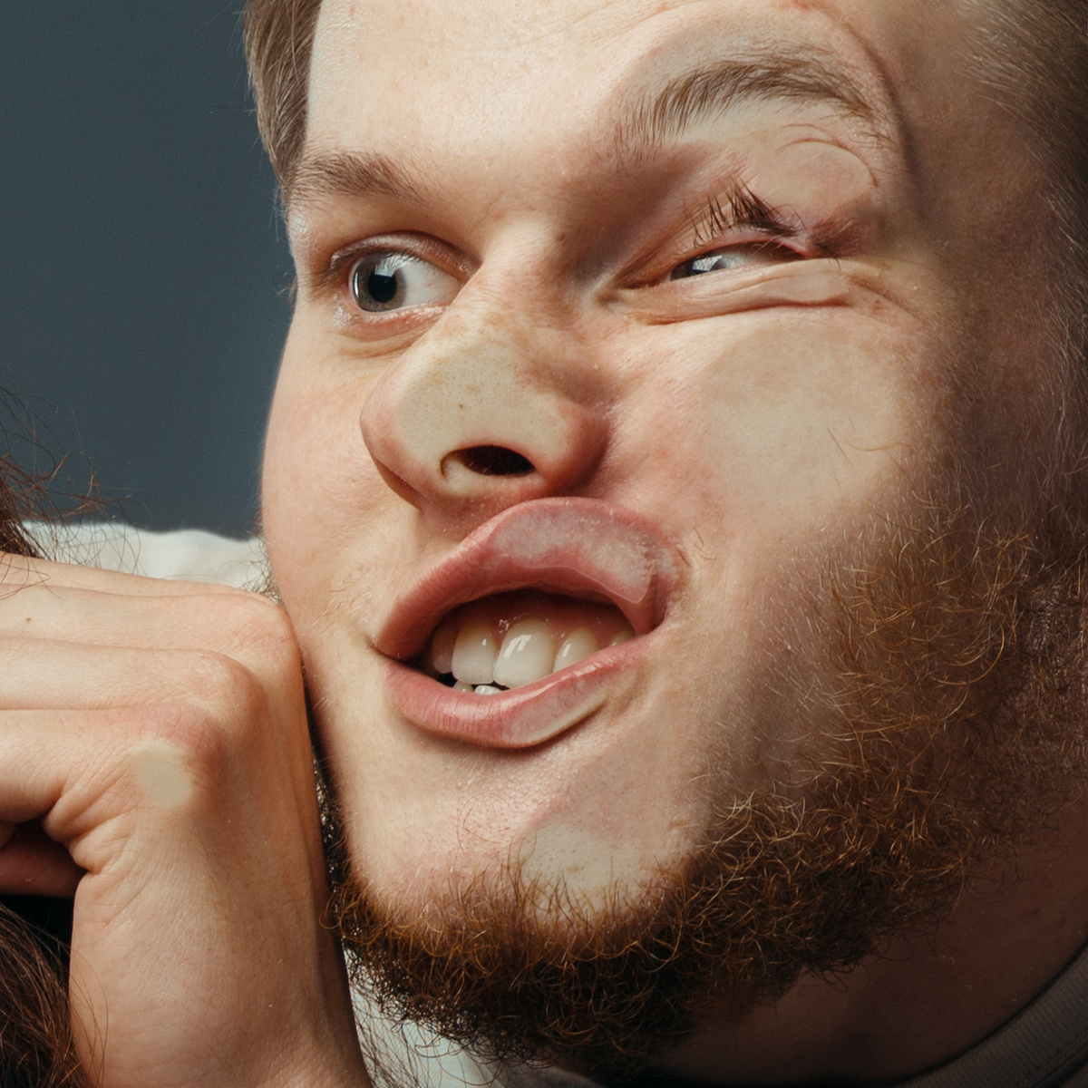 Man pressing face against glass to stare at unbelievable window deal
